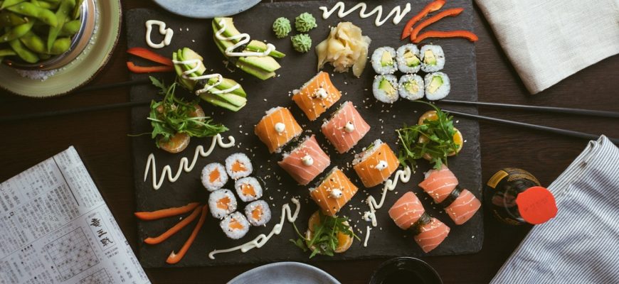 sushi on black ceramic plate